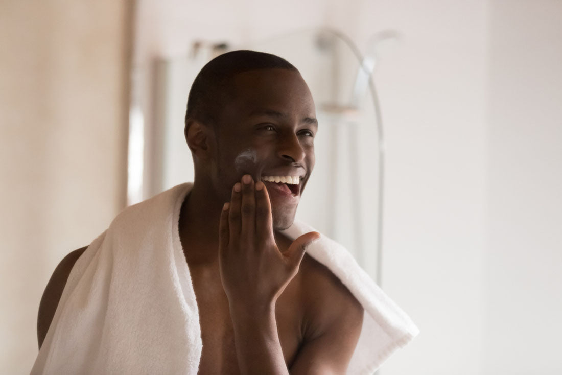 Man Cleaning Face